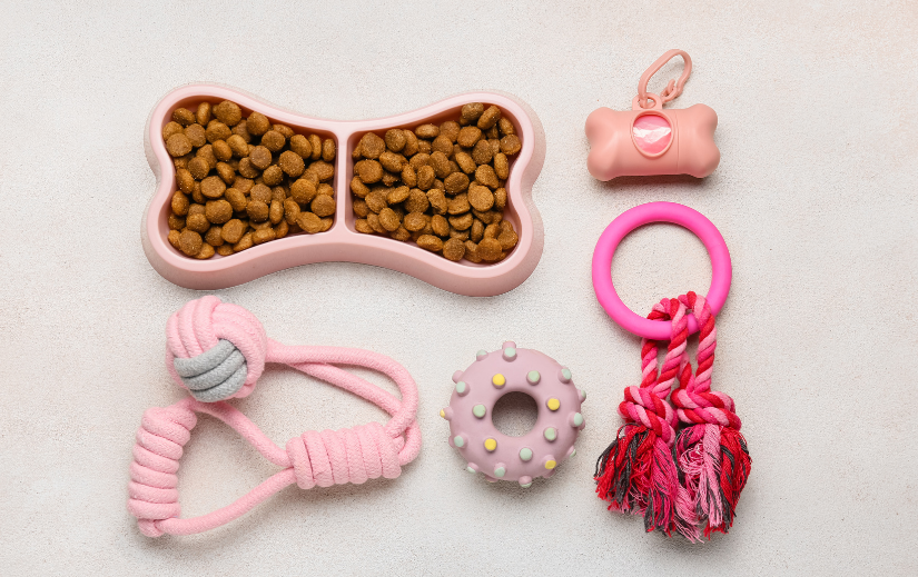 Pink-themed pet accessories and food bowl, a great product selection for an eCommerce site targeting the pet niche market.